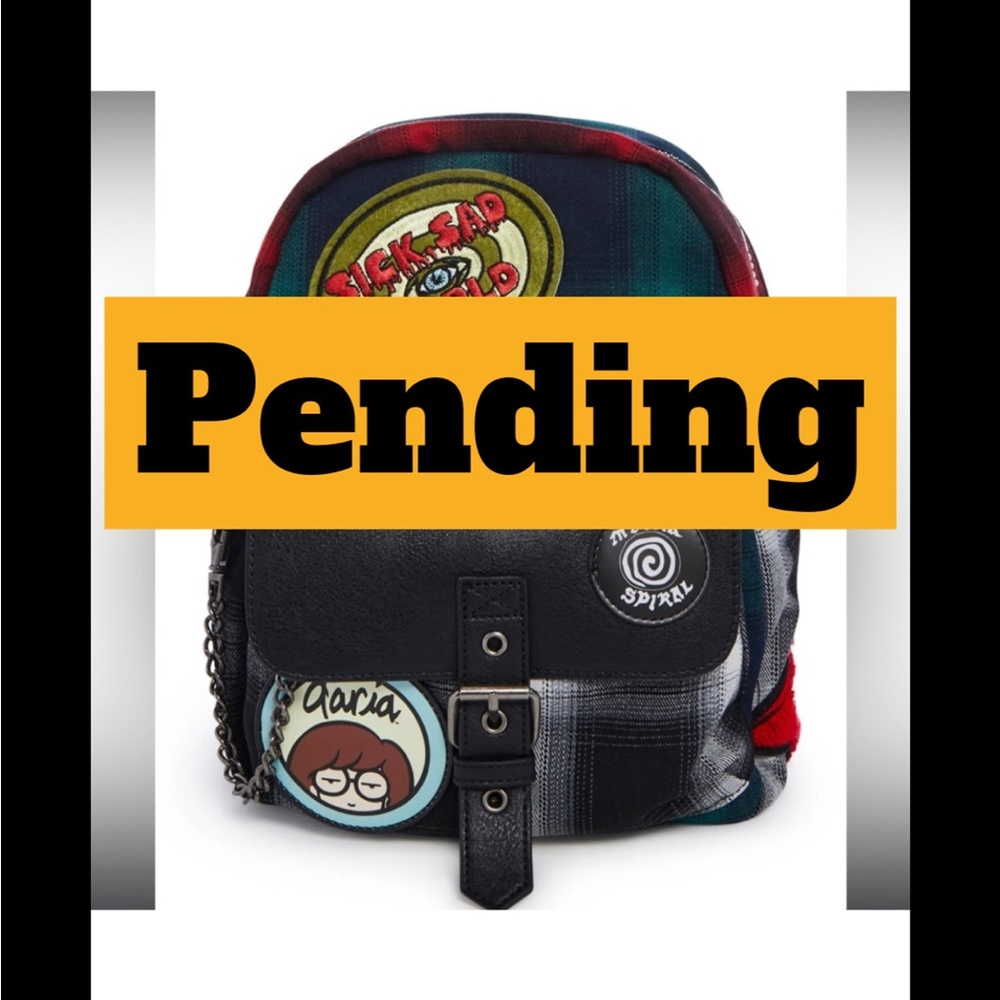 Plaid Backpack with Unique Patches